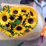 元気な人に　オレンジ・黄色系の花束