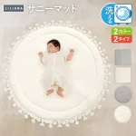 タッセル付きの丸いマットで、写真映えする遊び場に