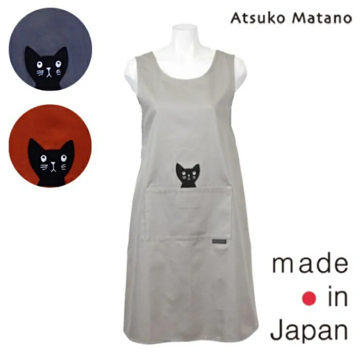 猫がポケットから「かつらぎのひょっこり黒猫」